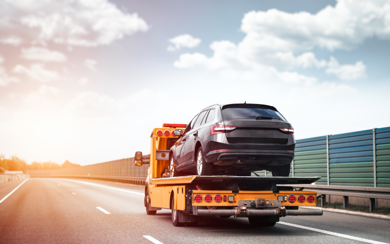 roadside assistance working with broken down car