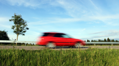 Red car on road