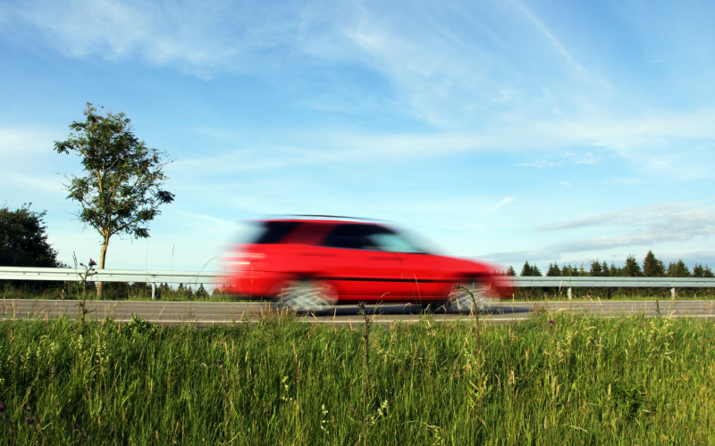 Red car on road