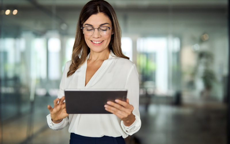 Executive woman holding a tablet.