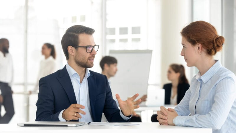 A mentor insurance agent works with a insurance agent student.