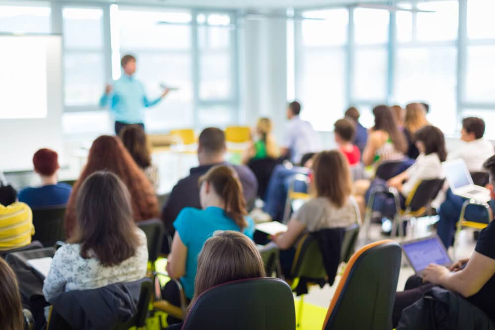 Classroom of people learning to be an insurance agent in New England