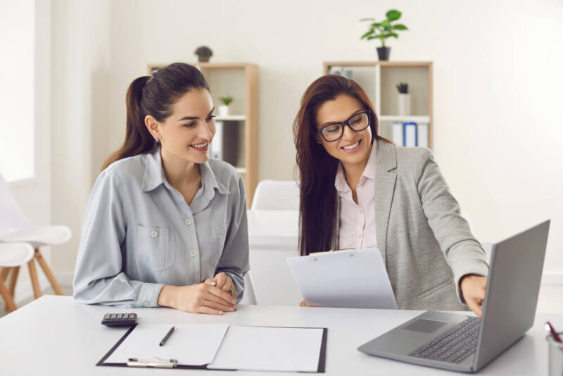 Two women independent insurance agents working from home - Bluefire, Best Insurance Solutions for Independent Agents