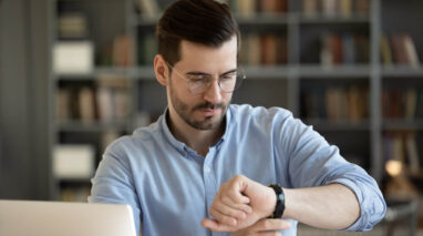 Man watching his clock - Time Management - Bluefire